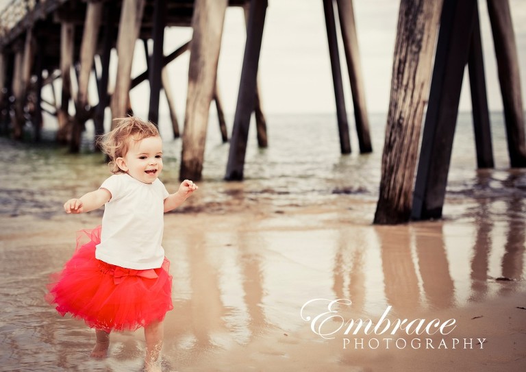 girl-fun-jetty-adelaide-family-photographer-embrace-photography